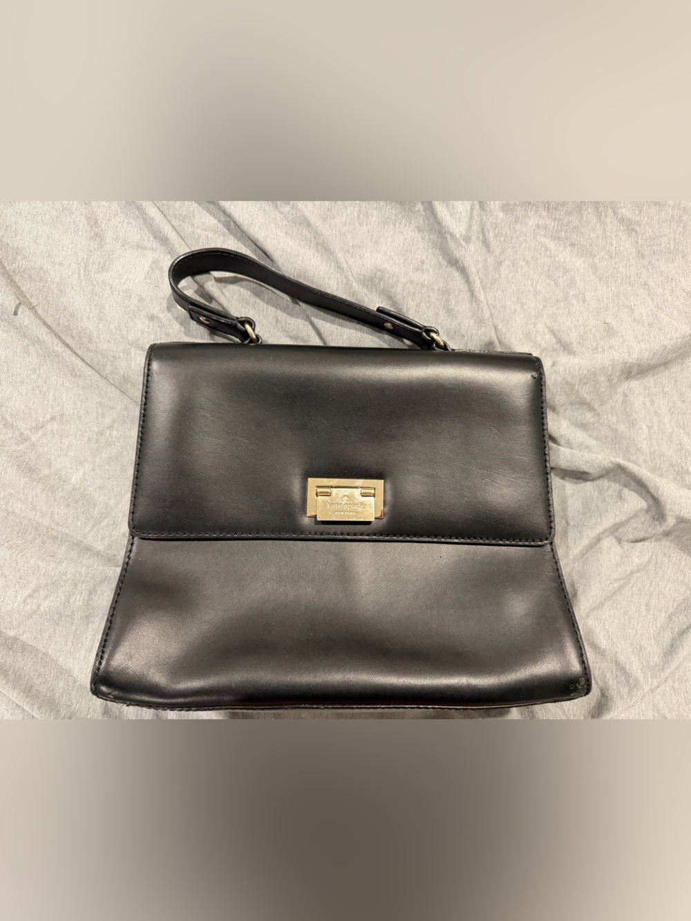 Kate Spade Black Leather Shoulder Bag with Gold Lock and strap